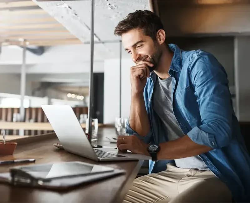 Man smiling at leads coming in